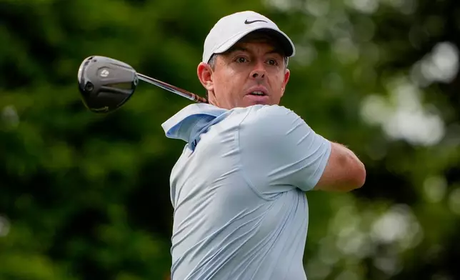 Rory McIlroy, of Northern Ireland, hits from the 16th tee during second round of the Truist Championship golf tournament at the Quail Hollow Club, Friday, May 8, 2026, in Charlotte, N.C. (AP Photo/Chris Carlson)