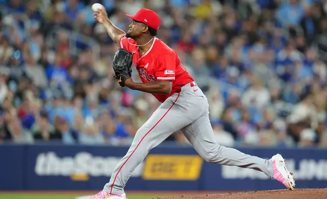 Los Angeles Angels pitcher José Soriano throws against the Toronto Blue Jays during first-inning baseball game action in Toronto, Sunday, May 10, 2026. (Frank Gunn/The Canadian Press via AP)
