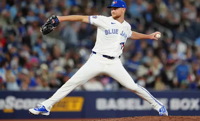 Toronto Blue Jays pitcher Eric Lauer throws against the Los Angeles Angels during the top of the fifth inning of a baseball game in Toronto, Sunday, May 10, 2026. (Frank Gunn/The Canadian Press via AP)