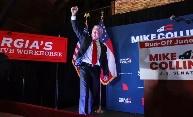 U.S. Rep. Mike Collins, R-Ga., walks out to speak at his primary election watch party in Jackson, Ga. on Tuesday, May 19, 2026. (Arvin Temkar/Atlanta Journal-Constitution via AP)