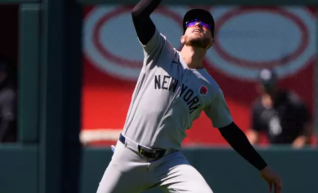 New York Yankees left fielder Cody Bellinger catches a fly ball for the out on Kansas City Royals' Jac Caglianone during the fourth inning of baseball game Monday, May 25, 2026, in Kansas City, Mo. (AP Photo/Charlie Riedel)