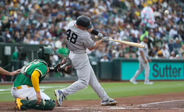 New York Yankees' Paul Goldschmidt hits a three-run home run during the first inning of a baseball game against the Athletics, Friday, May 29, 2026, in West Sacramento, Calif. (AP Photo/Scott Marshall)