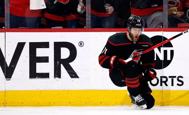 Carolina Hurricanes' Taylor Hall celebrates after his goal against the Montreal Canadiens during the first period in Game 5 of the Eastern Conference finals NHL hockey Stanley Cup playoff series in Raleigh, N.C., Friday, May 29, 2026. (AP Photo/Karl DeBlaker)