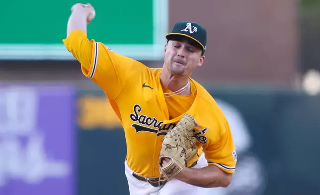 Athletics pitcher J.T. Ginn throws to a New York Yankees batter during the first inning of a baseball game Saturday, May 30, 2026, in West Sacramento, Calif. (AP Photo/Scott Marshall)