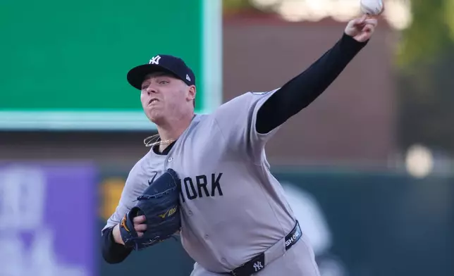 New York Yankees pitcher Ryan Weathers throws to an Athletics batter during the first inning of a baseball game Saturday, May 30, 2026, in West Sacramento, Calif. (AP Photo/Scott Marshall)