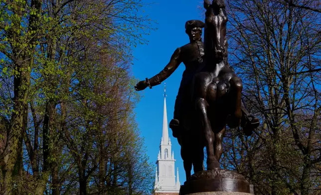 FILE - A statue of American patriot Paul Revere, famous for his 1775 ride to alert colonists of approaching British troops, stands near the Old North Church, Monday, April 20, 2026, in Boston. (AP Photo/Robert F. Bukaty, File)