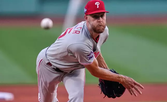 Philadelphia Phillies pitcher Zack Wheeler delivers during the first inning of a baseball game against the Boston Red Sox, Tuesday, May 12, 2026, in Boston. (AP Photo/Charles Krupa)