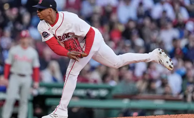 Boston Red Sox pitcher Brayan Bello delivers during the second inning of a baseball game against the Philadelphia Phillies, Tuesday, May 12, 2026, in Boston. (AP Photo/Charles Krupa)
