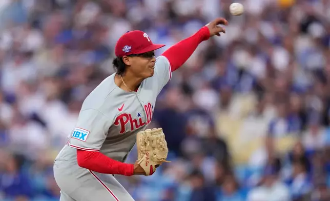Philadelphia Phillies starting pitcher Jesús Luzardo throws to the plate during the first inning of a baseball game against the Los Angeles Dodgers, Saturday, May 30, 2026, in Los Angeles. (AP Photo/Mark J. Terrill)