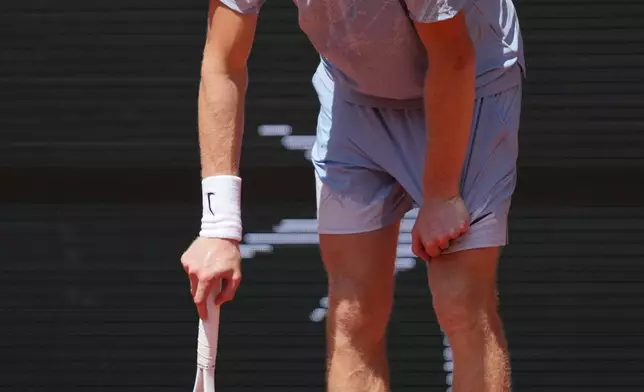Jannik Sinner of Italy reacts as he plays against Juan Manuel Cerundolo of Argentina during their second round men's singles tennis match at the French Open tennis tournament in Paris, Thursday, May 28, 2026. (AP Photo/Thibault Camus)