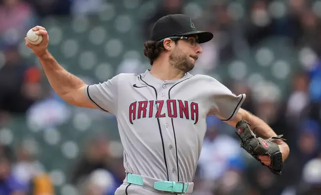 Arizona Diamondbacks starting pitcher Zac Gallen throws against the Chicago Cubs during the first inning of a baseball game Friday, May 1, 2026, in Chicago. (AP Photo/Erin Hooley)