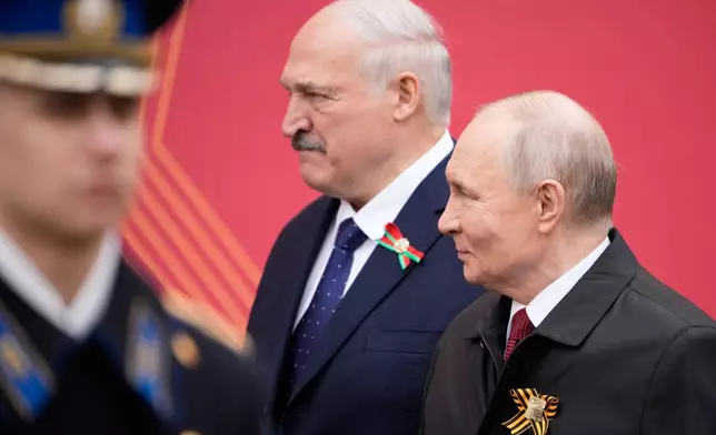 From left, Belarusian President Alexander Lukashenko and Russian President Vladimir Putin attend the Victory Day military parade in Moscow, Saturday, May 9, 2026, during celebrations of the 81st anniversary of the Soviet Union's victory over Nazi Germany during the World War II. (AP Photo/Pavel Bednyakov, Pool)