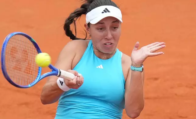 United States' Jessica Pegula returns the ball to Switzerland's Rebeka Masarova, during their match at the Italian Open tennis tournament in Rome, Sunday, May 10, 2026. (AP Photo/Andrew Medichini)