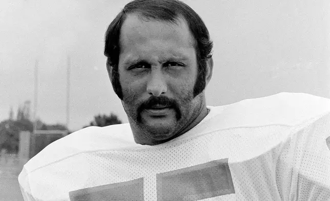 FILE - Miami Dolphins defensive tackle Manny Fernandez stands for a photo in Miami, Fla., July 18, 1973. (AP Photo/Jim Kerlin, File)
