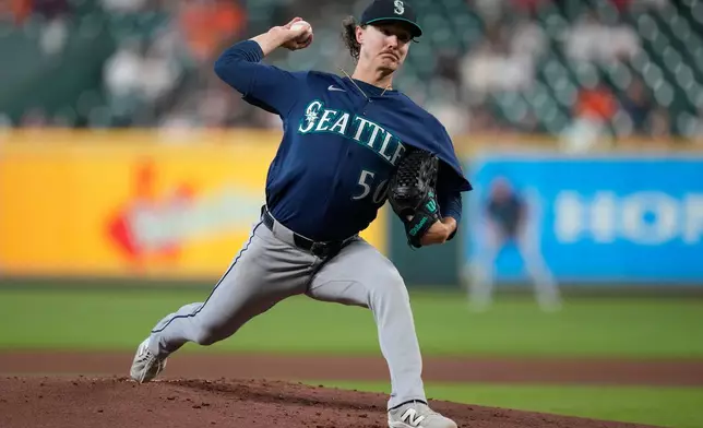 Seattle Mariners starting pitcher Bryce Miller throws during the first inning of a baseball game against the Houston Astros in Houston, Wednesday, May 13, 2026. (AP Photo/Ashley Landis)