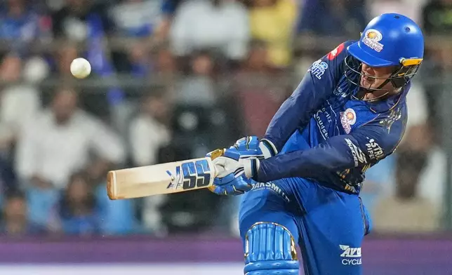 Mumbai Indians' Ryan Rickelton hits a six during the Indian Premier League cricket match between Mumbai Indians and Lucknow Super Giants in Mumbai, India, Monday, May 4, 2026.(AP Photo/Rafiq Maqbool)