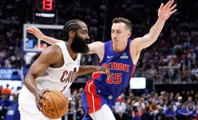 Cleveland Cavaliers guard James Harden (1) drives to the basket against Detroit Pistons forward Duncan Robinson (55) during the second half of Game 7 in a second-round NBA basketball playoffs series, Sunday, May 17, 2026, in Detroit. (AP Photo/Duane Burleson)
