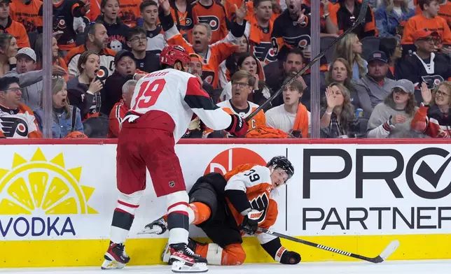 Carolina Hurricanes' K'andre Miller, left, collides with Philadelphia Flyers' Matvei Michkov during the second period of Game 3 in the second round of the NHL hockey Stanley Cup playoffs, Thursday, May 7, 2026, in Philadelphia. (AP Photo/Matt Slocum)