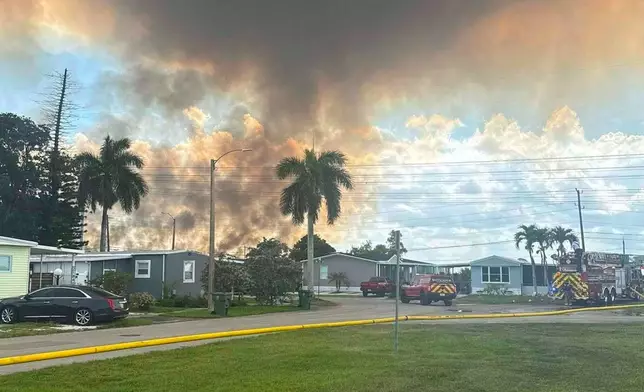 This May 10, 2026 image provided by Pembroke Pines Police Department shows smoke from wildfires burning across thousands of acres in the Florida Everglades. (Pembroke Pines Police Department via AP)