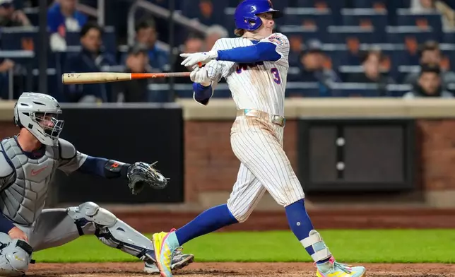 New York Mets' Carson Benge (3) hits a walk-off RBI single during the tenth inning of a baseball game against the Detroit Tigers, Wednesday, May 13, 2026, in New York. (AP Photo/Yuki Iwamura)