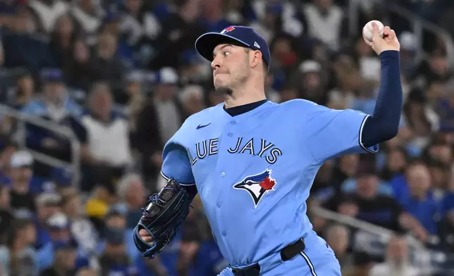 Toronto Blue Jays starting pitcher Patrick Corbin (46) throws to a Pittsburgh Pirates batter during the first inning of a baseball game in Toronto, Saturday, May 23, 2026. (Jon Blacker/The Canadian Press via AP)