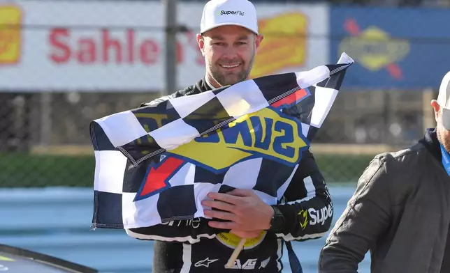 Shane Van Gisbergen celebrates after winning a NASCAR Cup Series auto race, Sunday, May 10, 2026, in Watkins Glen, N.Y. (Photo/Adrian Kraus)
