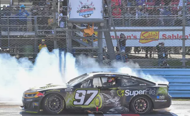 Shane Van Gisbergen does a burn out after winning a NASCAR Cup Series auto race, Sunday, May 10, 2026, in Watkins Glen, N.Y. (Photo/Adrian Kraus)