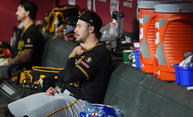 Pittsburgh Pirates starting pitcher Paul Skenes sits in the team dugout during the seventh inning of a baseball game against the Arizona Diamondbacks, Wednesday, May 6, 2026, in Phoenix. (AP Photo/Ross D. Franklin)