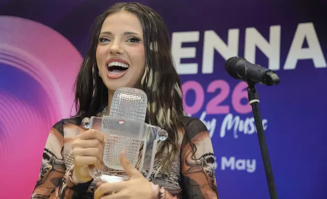 Eurovision 20026 winner Dara reacts upon her return home in Sofia on Sunday, May 17, 2026, giving the southeast European country its first-ever victory in the competition. (AP Photo/Valentina Petrova)