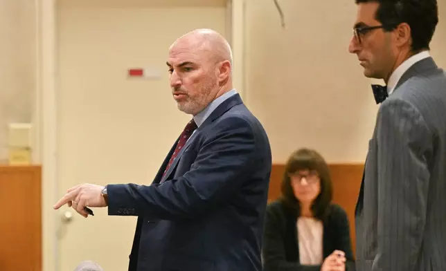Michael Goldstein, left, attorney for Britney Spears, speaks during her arraignment in a DUI case at the Ventura County Superior Court in Ventura, Calif., on Monday, May 4, 2026. (Frederic J. Brown/Pool Photo via AP)