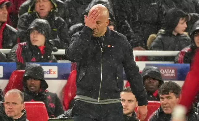 FILE - Liverpool's manager Arne Slot reacts on the touchline during the Champions League quarterfinal second leg soccer match between Liverpool and Paris Saint-Germain in Liverpool, England, Tuesday, April 14, 2026. (AP Photo/Dave Shopland, File)