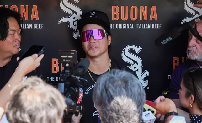 Chicago White Sox's Rikuu Nishida, of Japan, talks to media before a baseball game against the Minnesota Twins in Chicago, Monday, May 25, 2026. (AP Photo/Nam Y. Huh)