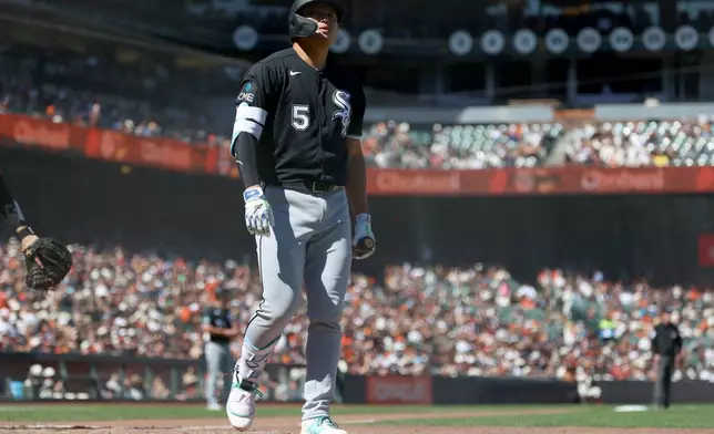 Chicago White Sox's Munetaka Murakami (5) walks back to the dugout after striking out during the ninth inning of a baseball game against the San Francisco Giants in San Francisco, Sunday, May 24, 2026. (AP Photo/Jed Jacobsohn)