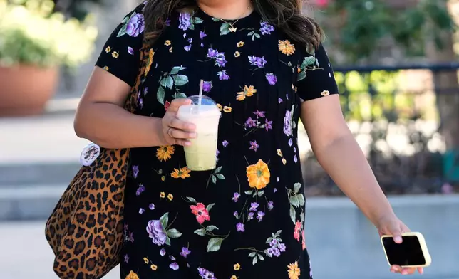 Melani Candia, whose DACA status has lapsed, at a neighborhood in Orlando, Fla., on April 23, 2026. (AP Photo/John Raoux)
