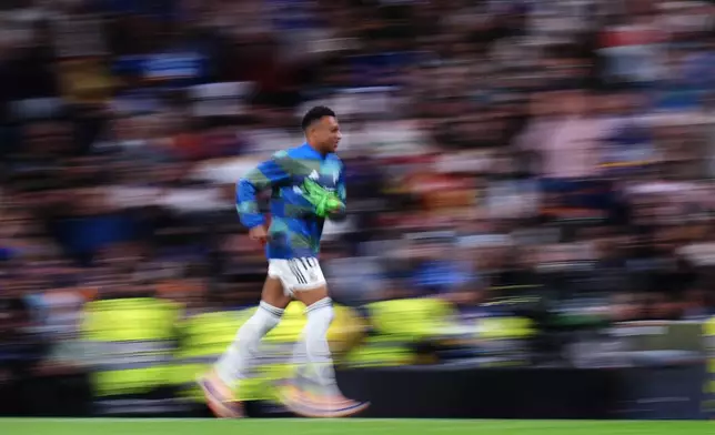 Real Madrid's Kylian Mbappe warms-up during the Spanish La Liga soccer match between Real Madrid and Real Oviedo in Madrid, Spain, Thursday, May 14, 2026. (AP Photo/Manu Fernandez)