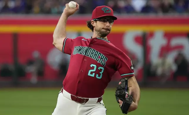 Arizona Diamondbacks pitcher Zac Gallen throws against the Colorado Rockies in the first inning of a baseball game, Saturday, May 23, 2026, in Phoenix. (AP Photo/Rick Scuteri)