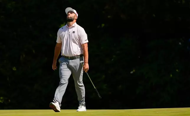 Jon Rahm, of Spain, reacts to a missed putt on the 12th green during the third round of the PGA Championship golf tournament at Aronimink Golf Club, Saturday, May 16, 2026, in Newtown Square, PA. (AP Photo/Matt Slocum)