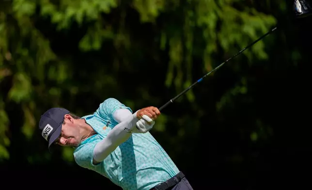 Alex Smalley hits from the fourth tee during the third round of the PGA Championship golf tournament at Aronimink Golf Club, Saturday, May 16, 2026, in Newtown Square, PA. (AP Photo/Carolyn Kaster)