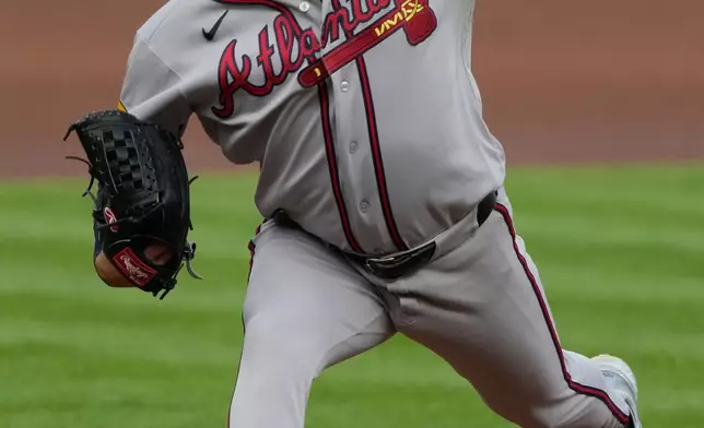 Atlanta Braves pitcher Martin Perez throws during the first inning of a baseball game against the Cincinnati Reds in Cincinnati, Saturday, May 30, 2026. (AP Photo/Carolyn Kaster)