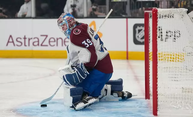 Colorado Avalanche goaltender MacKenzie Blackwood (39) stops the puck during the second period in Game 4 of the Western Conference finals NHL hockey Stanley Cup playoff series against the Vegas Golden Knights Tuesday, May 26, 2026, in Las Vegas. (AP Photo/John Locher)