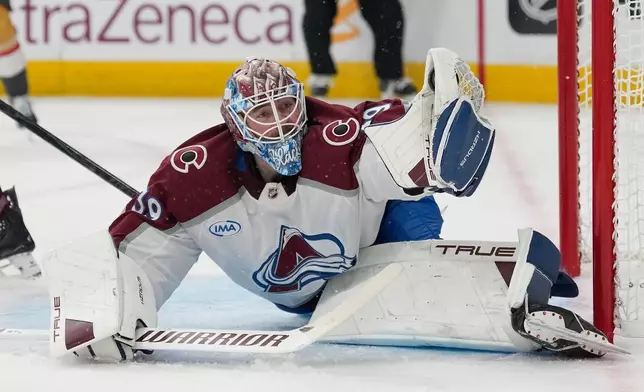 Colorado Avalanche goaltender MacKenzie Blackwood (39) stops a shot during the second period in Game 4 of the Western Conference finals NHL hockey Stanley Cup playoff series against the Vegas Golden Knights Tuesday, May 26, 2026, in Las Vegas. (AP Photo/John Locher)