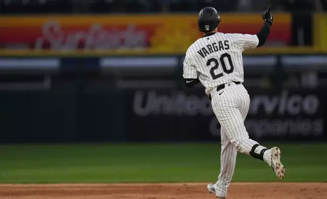 Chicago White Sox's Miguel Vargas runs the bases after hitting a home run during the fifth inning of a baseball game against the Seattle Mariners, Saturday, May 9, 2026, in Chicago. (AP Photo/Erin Hooley)