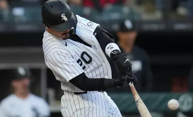 Chicago White Sox's Miguel Vargas hits a two-run home run during the third inning of a baseball game against the Seattle Mariners, Saturday, May 9, 2026, in Chicago. (AP Photo/Erin Hooley)