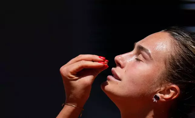 Aryna Sabalenka of Belarus reacts as she plays against Jessica Bouzas Maneiro of Spain during their first round women's singles tennis match at the French Open tennis tournament in Paris, Tuesday, May 26, 2026. (AP Photo/Christophe Ena)