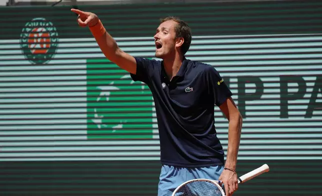 Daniil Medvedev of Russia reacts as he plays against Adam Walton of Australia during their first round men's singles tennis match at the French Open tennis tournament in Paris, Tuesday, May 26, 2026. (AP Photo/Aurelien Morissard)