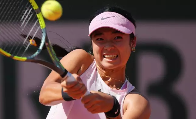 Alexandra Eala of Philippines returns to Iva Jovic of the U.S. during their first round men's singles tennis match at the French Open tennis tournament in Paris, Tuesday, May 26, 2026. (AP Photo/Aurelien Morissard)