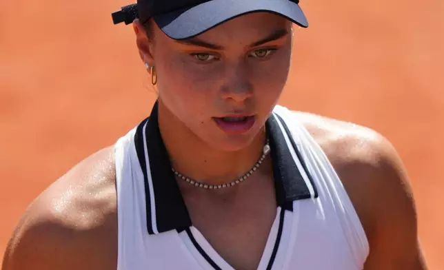 Iva Jovic of the U.S. reacts as she plays against Alexandra Eala of Philippines during their first round men's singles tennis match at the French Open tennis tournament in Paris, Tuesday, May 26, 2026. (AP Photo/Aurelien Morissard)