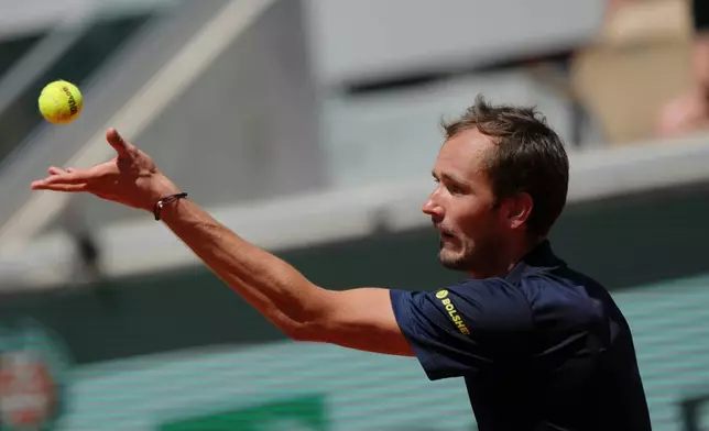 Daniil Medvedev of Russia serves to Adam Walton of Australia during their first round men's singles tennis match at the French Open tennis tournament in Paris, Tuesday, May 26, 2026. (AP Photo/Aurelien Morissard)