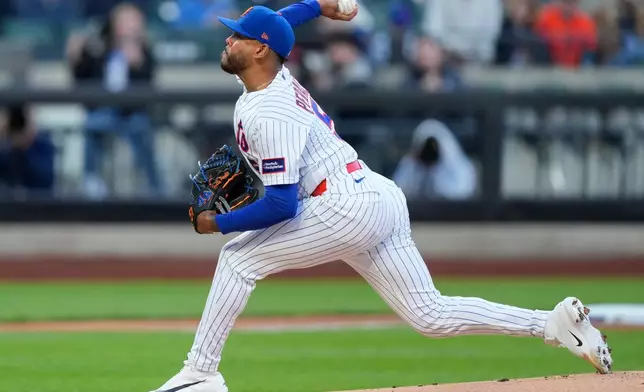 New York Mets starting pitcher Freddy Peralta (51) throws during the first inning of a baseball game against the Detroit Tigers, Tuesday, May 12, 2026, in New York. (AP Photo/Yuki Iwamura)