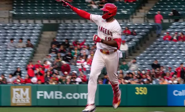 Los Angeles Angels' Jorge Soler gestures as he rounds second after hitting a solo home run during the first inning of a baseball game against the Chicago White Sox, Tuesday, May 5, 2026, in Anaheim, Calif. (AP Photo/Mark J. Terrill)
